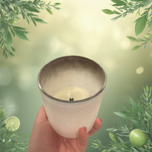 An example of a white candle with a black soot build up inside it.