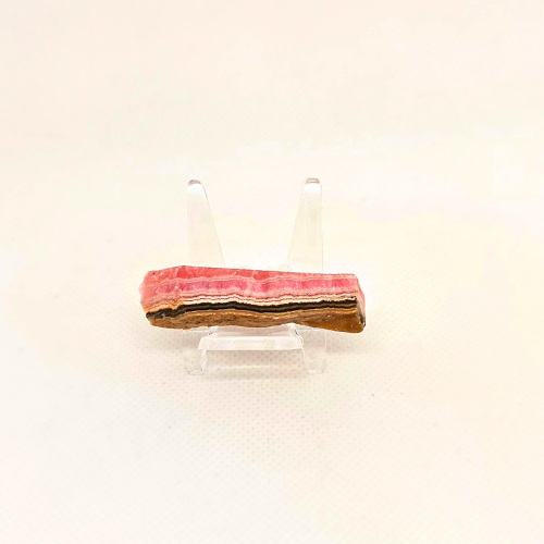 Rhodochrosite Polished Mini Slice on a Perspex Stand to showcase it.