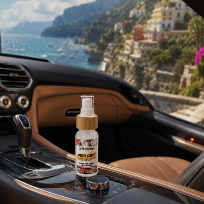 Amalfi Coast car air freshener bottle placed on the inside middle console of a sports car.