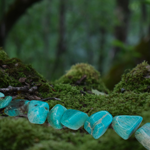 Amazonite Tumble Pocket Stone in colours of aqua green with a hint of brown.