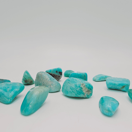 Amazonite Tumble Pocket Stone in colours of aqua green with a hint of brown.