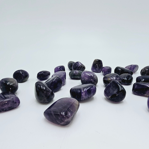Amethyst Tumble Pocket Stone in colours of purple