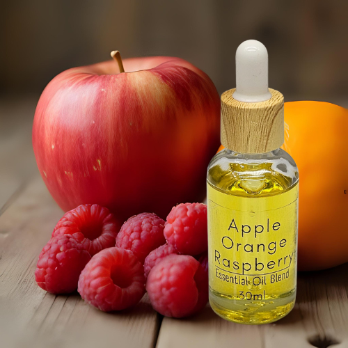 30ml Diffuser Oil Bottle of Apple Orange Raspberry 'Essential Oil' blend with fruits on a wooden surface.