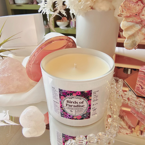 Our large White Candle infused with our Birds of Paradise luxury fragrance featured without the accompanying Rose Gold Lid.