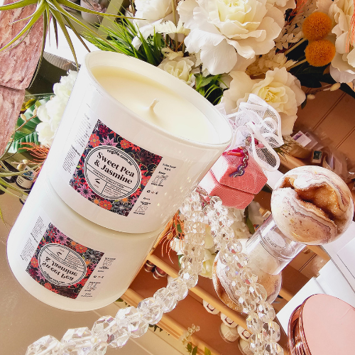 Large White Candle infused with Sweet Pea & Jasmine floral fragrance featured without the accompanying Rose Gold Lid.