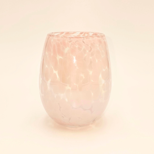 This is a glass candle jar with a pink cheetah design