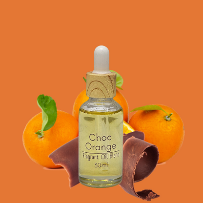 Diffuser Oil Bottle of Choc Orange fragrant oil blend with oranges and chocolate on an orange background