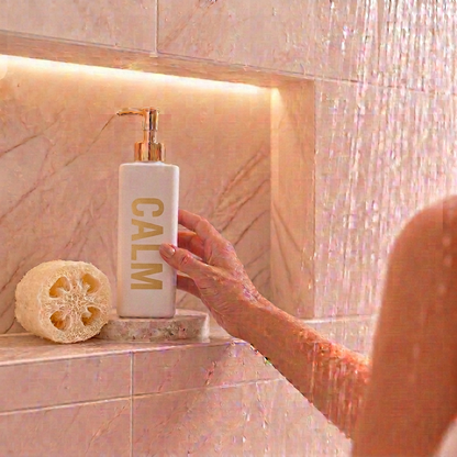 500ml White Triangle Calm Coconut Body Wash Bottle.