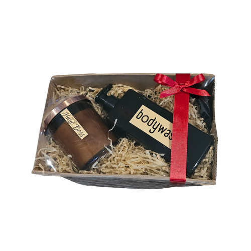 A Gift set of a Mens Coconut Body Wash with a cologne type scent Hugo Boss with a matching candle.