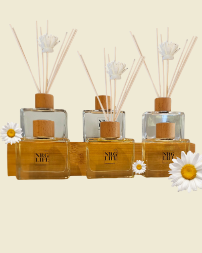 A two tiered group of Reed Diffusers.