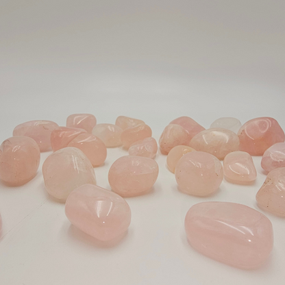 Rose Quartz Tumble Pocket Stone in colour of pink.
