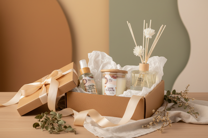 Japanese Honeysuckle Gift box with decorative items including a Diffuser, Candle, and Room Spray on a wooden surface.