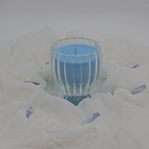 Video of Romantic Double Walled Glass Candle infused with Flowerbomb scent.