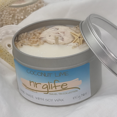 Silver Tin Candle with Perspex Lid with decorative shells on top and infused with Coconut Lime Fragrance