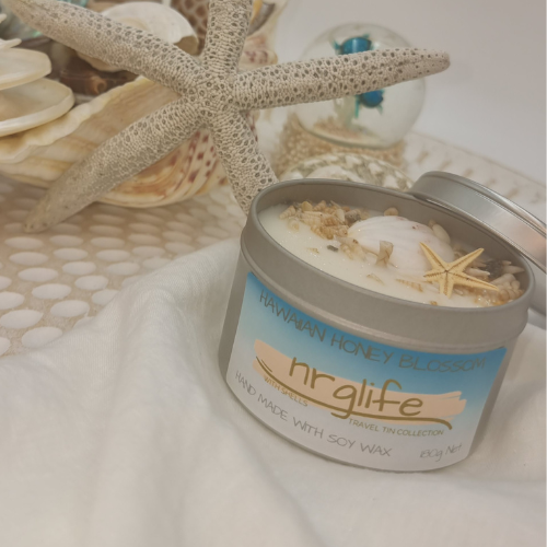 Silver Tin Candle with Perspex Lid with decorative shells on top and infused with Hawaiian Honey Blossom Fragrance