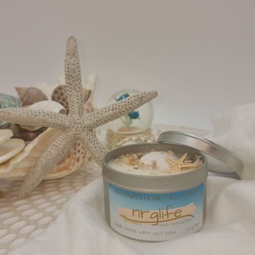 Silver Tin Candle with Perspex Lid with decorative shells on top and infused with Hawaiian Honey Blossom Fragrance